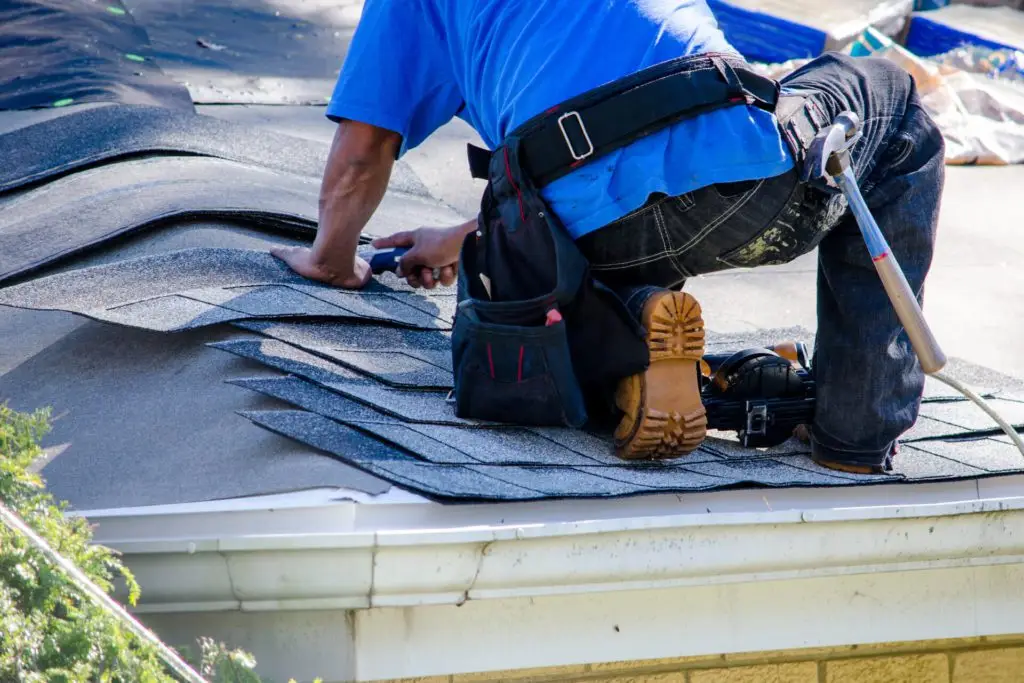 Roofing Contractor Completing Roof Replacement In Dallas Texas
