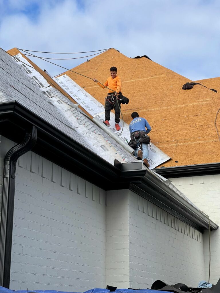 Roofing contractors replacing Roof