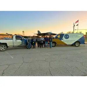 Photo of the team in front of the Shepphard Air Force