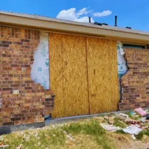 the before photo of a car crashing into home