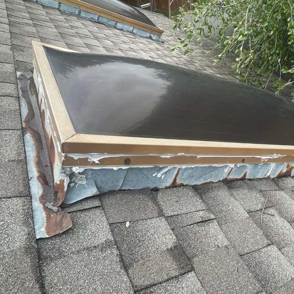 Skylight Repair - old rusted flashing and skylight