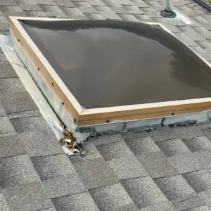 Skylight Repair- exposed flashing and missing shingles