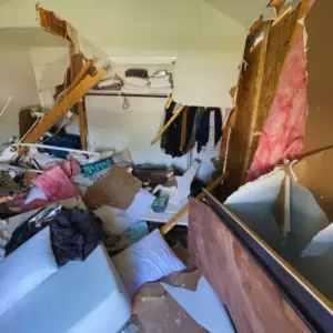 the before photo of a car crashing into home