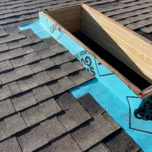 removed old shingles and flashing and added shield guard