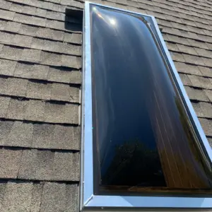 Newly repaired skylight with new flashing and skylight
