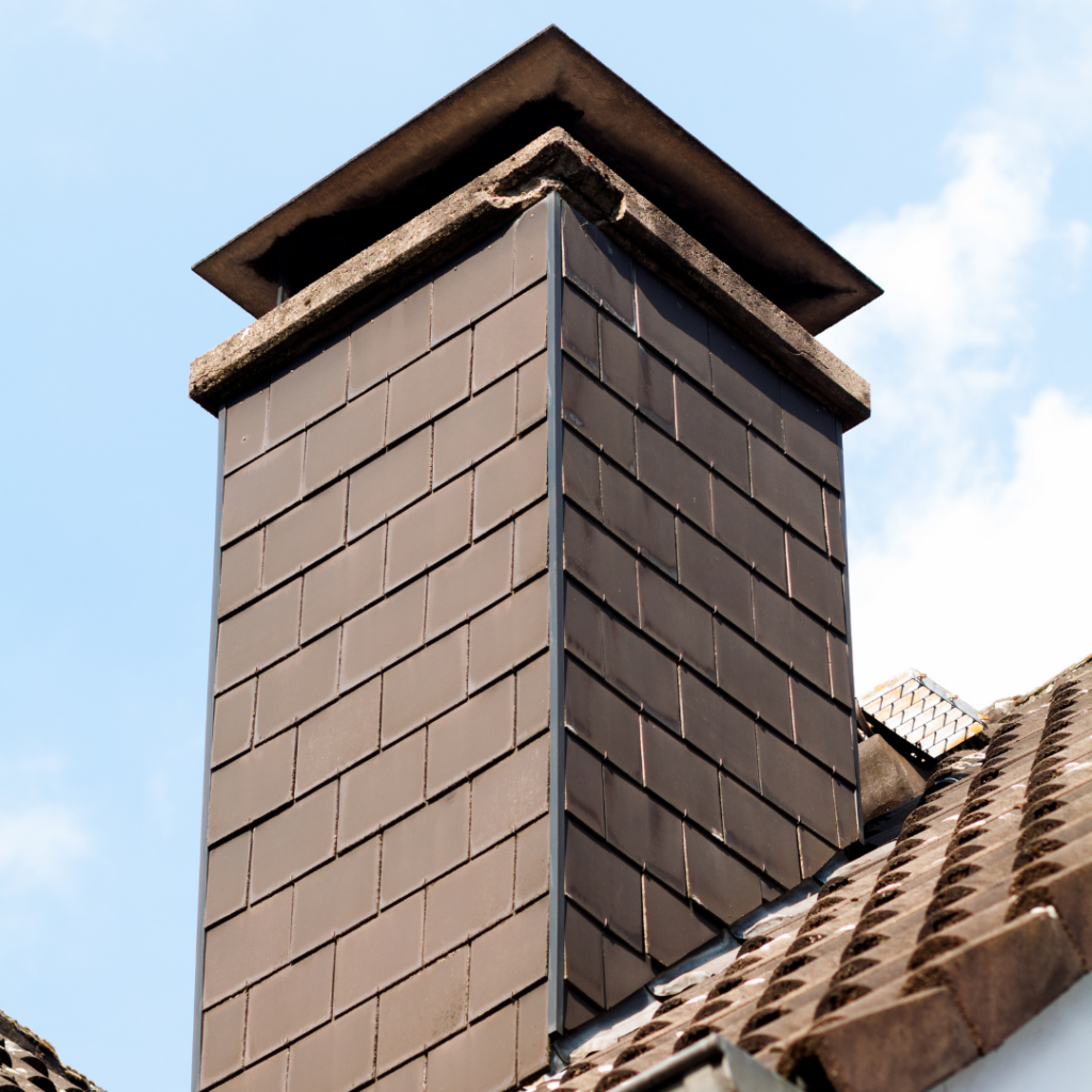 repairing chimney siding on a house with Shepherd roofing and renovations near me