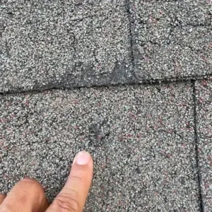 Old roof damage from hail storm