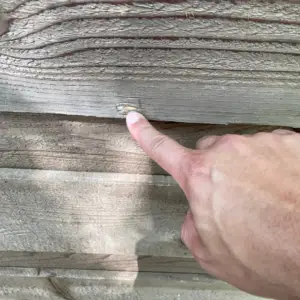 Hail damage on fence
