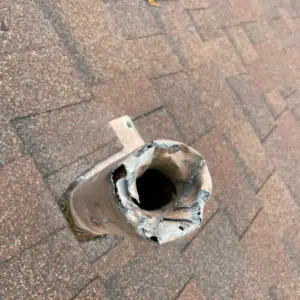 old damaged roof pipe