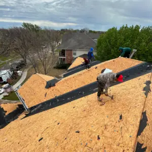 replacing shingles on a roof
