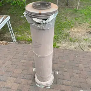 old damaged roof pipe