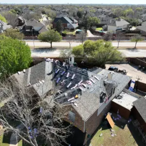 replacing shingles on a roof