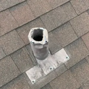 old damaged roof pipe
