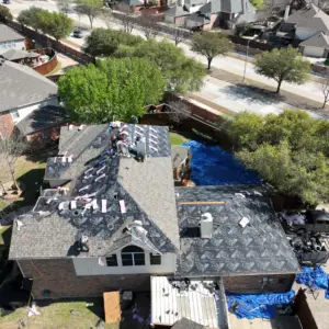 replacing shingles on a roof