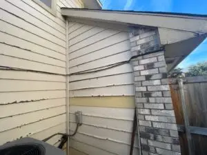 siding on a home that is missing and chipped siding