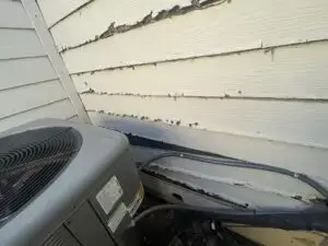 siding on a home that is missing and chipped siding
